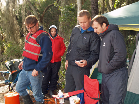 Skidaway Institute's Zac Tait, Thais Bittar, Rob Spencer (FSU) and Aron Stubbins prepare for a sample collection.
